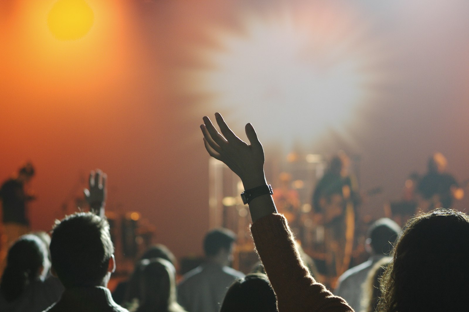Believers worshipping together at sunrise